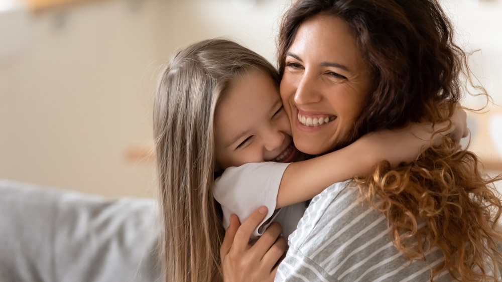 mom and child smilling