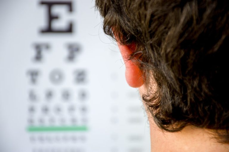 man taking an eye exam
