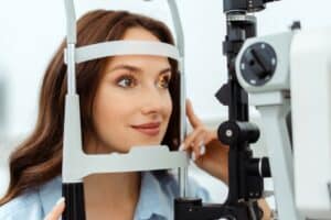 Young lady eye exam with eye doctor