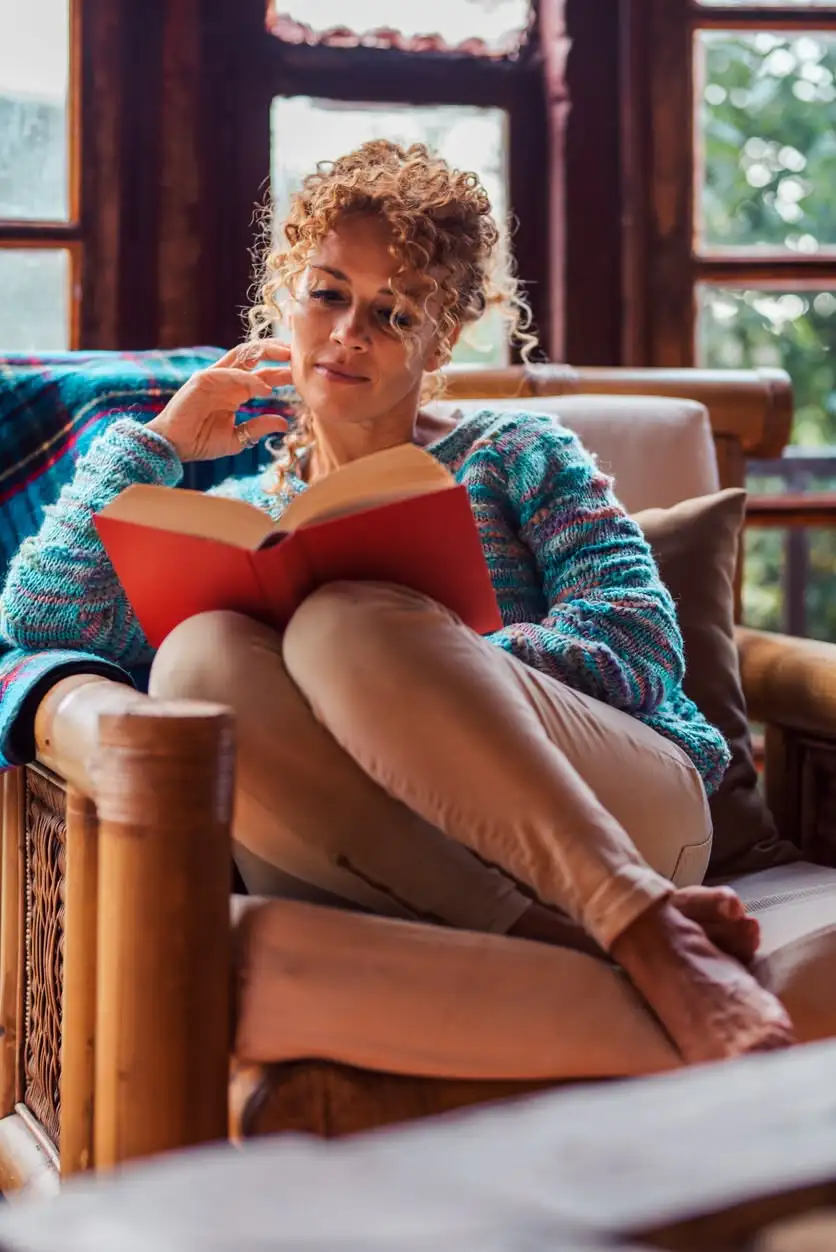 Woman reading a book without glasses